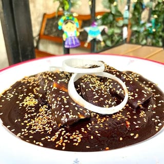 Queens' Mole Poblano Chicken Enchiladas
